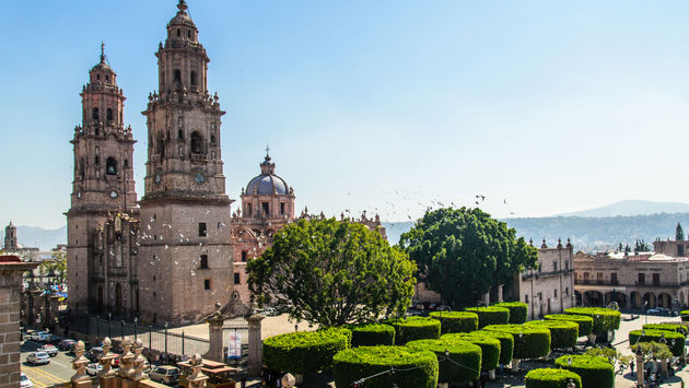 High point of view of Morelia Cathedral and town square. (photo via Esdelval / iStock / Getty Images Plus)
