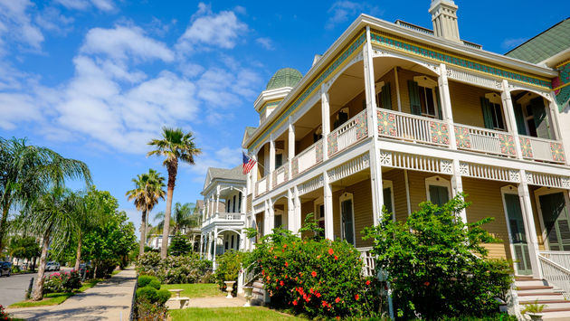 Beautiful vintage homes in the historic district of Galveston, Texas.  (photo via Raluminate/iStock/Getty Images Plus)